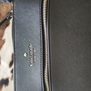 Kate spades cross body, black purse.